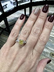 Radiant Cut Yellow Diamond Ring with Tapered Baguette Accents