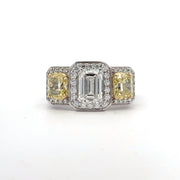 Emerald Cut Canadian Diamond Ring with Fancy Yellow Radiant Diamond Accents