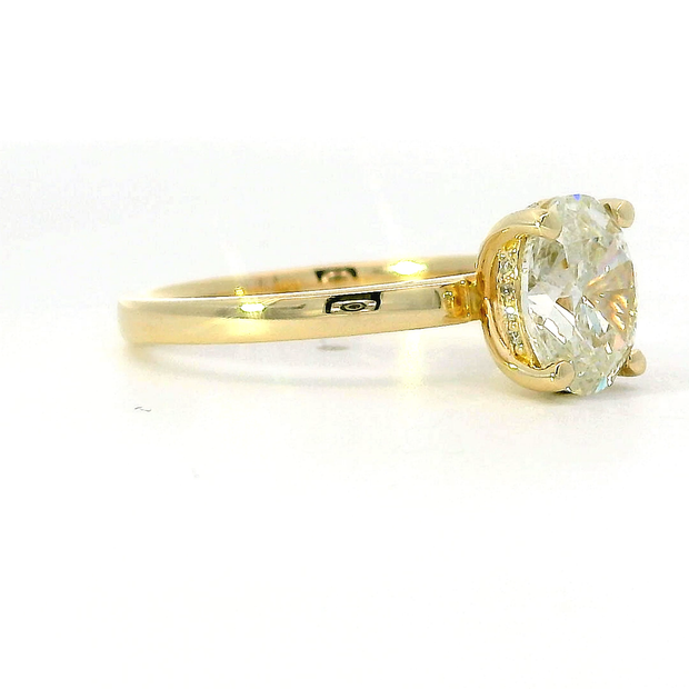 Oval Diamond Solitaire Ring with Hidden Halo