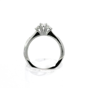 Vintage Three-Stone Ring with Milgrain Detailing