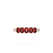 Oval Cut Ruby Eternity Band in 18kt Rose Gold