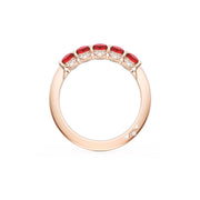 Round Cut Ruby Eternity Band in 18kt Rose Gold
