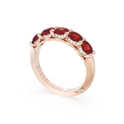 Round Cut Ruby Eternity Band in 18kt Rose Gold