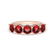 Round Cut Ruby Eternity Band in 18kt Rose Gold