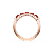 Oval Cut Ruby Eternity Band in 18kt Rose Gold