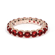Round Cut Ruby Eternity Band in 18kt Rose Gold