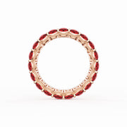 Round Cut Ruby Eternity Band in 18kt Rose Gold