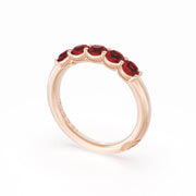 Round Cut Ruby Eternity Band in 18kt Rose Gold