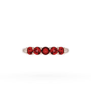 Round Cut Ruby Eternity Band in 18kt Rose Gold