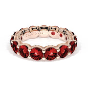 Round Cut Ruby Eternity Band in 18kt Rose Gold