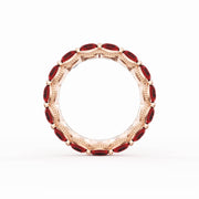 Round Cut Ruby Eternity Band in 18kt Rose Gold