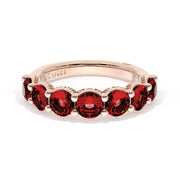 Round Cut Ruby Eternity Band in 18kt Rose Gold