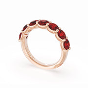 Round Cut Ruby Eternity Band in 18kt Rose Gold