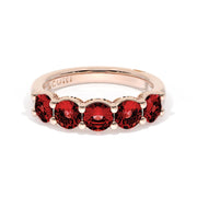 Round Cut Ruby Eternity Band in 18kt Rose Gold