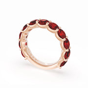 Round Cut Ruby Eternity Band in 18kt Rose Gold
