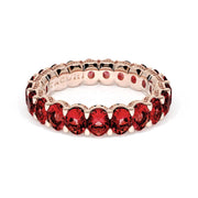 Oval Cut Ruby Eternity Band in 18kt Rose Gold