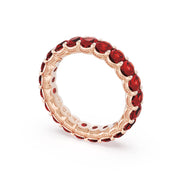 Oval Cut Ruby Eternity Band in 18kt Rose Gold