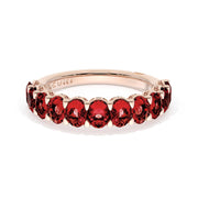 Oval Cut Ruby Eternity Band in 18kt Rose Gold