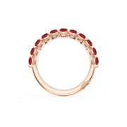 Oval Cut Ruby Eternity Band in 18kt Rose Gold