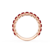 Oval Cut Ruby Eternity Band in 18kt Rose Gold