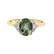 Bague avec saphir vert taille ovale et diamants canadiens