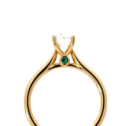 Oval Diamond Solitaire Engagement Ring with Peekaboo Emeralds