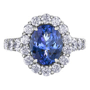 Oval Tanzanite and Diamond Halo Ring
