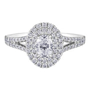 Accented Split Shank Oval Diamond Ring with Double Halo
